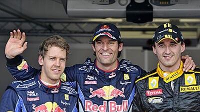 Mark Webber, the pole-sitter, centre, flanked by Robert Kubica, right, who starts second and Red Bull teammate Sebastian Vettel, who starts third.