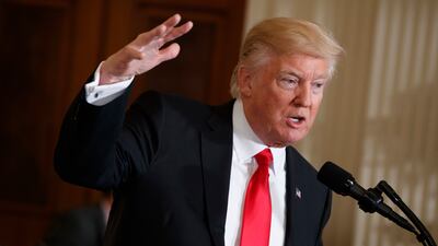 US president Donald Trump speaks in the East Room of the White House in Washington on January 27, 2017. Evan Vucci / AP Photo