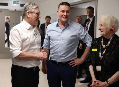 Wes Streeting, centre, and Keir Starmer visiting a London hospital. AFP