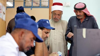 Jordanians vote in elections in Amman, Jordan, on Tuesday, September. 20, 2016. Jordanians are voting for a new parliament under revised rules meant to strengthen political parties and usher in democratic reform. Raad Adayleh / AP