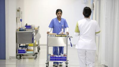 Nurses in the emergency department at Burjeel Hospital, Abu Dhabi. Intensive care units in the emirate are still overstretched and understaffed, according to health staff, while there is also a shortfall in specialist healthcare workers. Silvia Razgova / The National