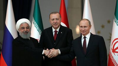 Presidents Hassan Rouhani of Iran, Tayyip Erdogan of Turkey and Vladimir Putin of Russia pose before their meeting in Ankara, Turkey