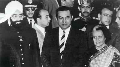 Egyptian President Hosni Mubarak, centre, is flanked by President of India Giani Zail Singh (L) and Prime Minister of India Indira Gandhi (R), on November 30, 1982 in New Delhi. AFP