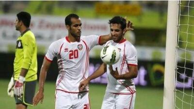 Ali Mabkhout, right, scored four goals for the UAE against Bahrain in Dubai tonight. Pawan Singh / The National