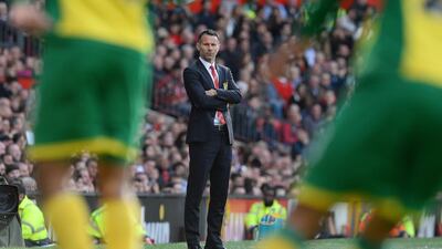 Manchester United caretaker manager Ryan Giggs is pictured during the English Premier League football match between Manchester United and Norwich City at Old Trafford in Manchester, northwest England, on April 26, 2014. AFP PHOTO/ANDREW YATES