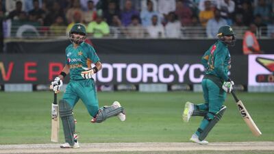 Pakistan batsmen Babar Azam, left, and Asif Ali helped guide their side to a series-clinching win over New Zealand in Dubai. AFP