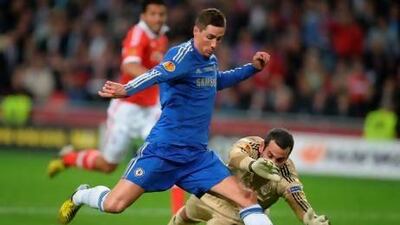 Fernando Torres, left, opened the scoring to give Chelsea the early lead. After Oscar Cardozo tied it for Benfica at the 68th minute, Branislav Ivanovic’s header in stoppage time lifted the Blues to the Europa League title.