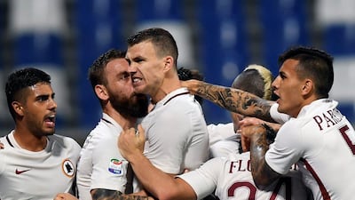 Edin Dzeko is now top of the Serie A scoring charts with 10 goals. Alberto Lingria / Reuters