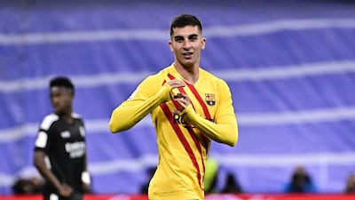 Ferran Torres celebrates after scoring for Barcelona against Real Madrid. AFP