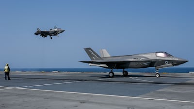 A fighter jet prepares to land on the flight deck of UK Carrier Strike Group’s 'HMS Queen Elizabeth' in the Arabian Sea, off Mumbai. AFP