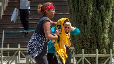 Family members react at Addis Ababa international airport. AP Photo