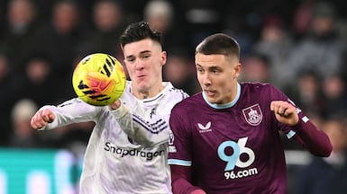 Manchester United's Benjamin Sesko, left, tangles with Burnley's Maxime Esteve. AFP