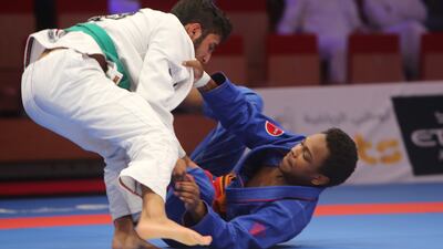 Abdul Stevens from USA, in blue, in action against the UAE's Khalifa Humaid at the Abu Dhabi's World Professional Jiu Jitsu Championship 2016. Ravindranath / The National