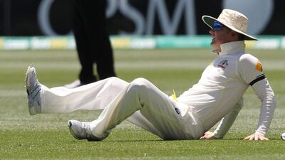 Australia's Michael Clarke shown after injuring himself in the first Test against Indie in Adelaide on Saturday. James Elsby / AP / December 13, 2014