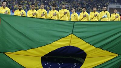 Brazil’s players stand for the national anthems before a quarter-final match of the men’s Olympic football tournament between Brazil and Colombia in Sao Paulo, Brazil, Saturday August 13, 2016. Leo Correa / AP Photo
