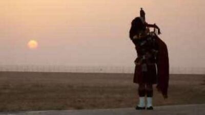 One of the most moving moments during the recording of the Royal Scots Dragoon Guards' new album, Spirit of the Glen: Journey , was when the pipe major Ross Munro, pictured above in full Highland dress, walked out to the edge of a runway in Basra to record his solo piping for Flowers of the Forest .