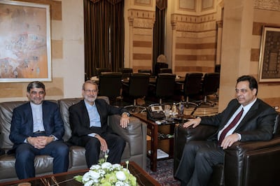 Lebanese Prime Minister Hassan Diab meets with Iranian Parliament Speaker Ali Larijani at the government palace in Beirut. EPA