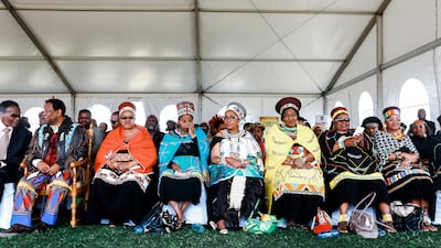 From left, Prince Mangosuthu Buthelezi, the late King Goodwill, Zulu queens Sibongile Dlamini, Buhle Mathe, the late Mantfombi Dlamini, Thandekile Ndlovu, Nompumelelo Mamchiza and Zola Mafu attend a Zulu festival in 2013. AFP