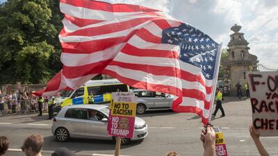 Protesters gather at the gates of Blenheim Palace. Getty Images