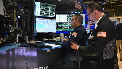 Traders work on the floor of the New York Stock Exchange. The initial euphoria about President-elect Donald Trump’s pro-business agenda has begun to fade. AFP