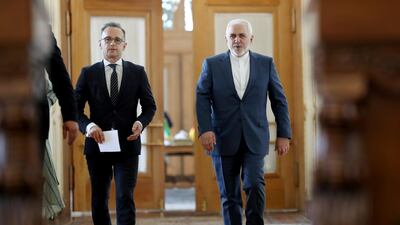 Iranian Foreign Minister Mohammad Javad Zarif and his German counterpart Heiko Maas walk to a press conference after their talks, in Tehran on Monday, June 10, 2019. AP Photo