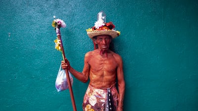A man, his skin painted in red dye, during a feast day procession celebrating Saint Dominic of Guzman, in Managua, Nicaragua. EPA
