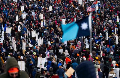 People attend a public memorial service for Renee Good in Powderhorn Park in Minneapolis, Minnesota. Getty Images