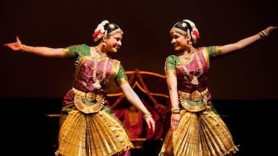 Dancers perform during a performance by the Soorya Dance Company at Wellington International School.
