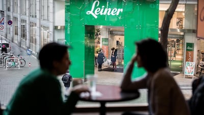 Customers stand in the entrance of the Steihoff operated Leiner flagship store in Vienna, Austria. Akos Stiller/Bloomberg