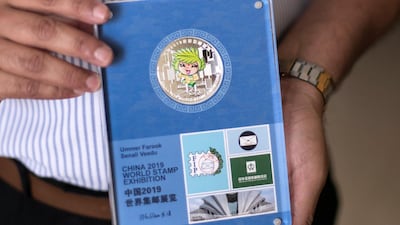 Ummer Farook won a silver medal at the World Stamp Exhibition in China. Reem Mohammed / The National