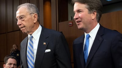 US Supreme Court nominee Brett Kavanaugh, left, with Republican senator Chuck Grassley. AFP