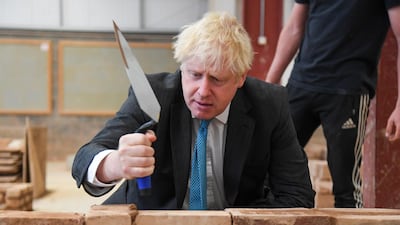 British Prime Minister Boris Johnson during his visit to Exeter College on September 29, 2020 in Exeter, England. Finnbarr Webster/Getty Images