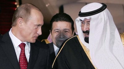Russian President Vladimir Putin and Saudi King Abdullah during an official welcoming ceremony at the airport in Riyadh February 11, 2007. AFP Photo