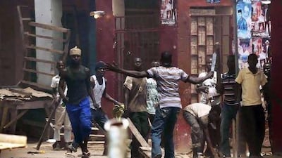 A youth brandishes crude weapons during riots in Bauchi, nothern Nigeria. after Goodluck Jonathan was declared winner of presidential elections.
