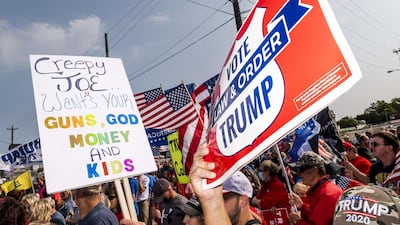 Supporters of Democratic presidential nominee and former Vice President Joe Biden and President Donald Trump rally outside the Wisconsin Aluminum Foundry on September 21, 2020 in Manitowoc, Wisconsin. AFP