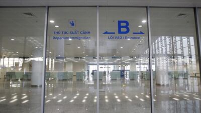 A worker leaves the immigration hall of the new terminal of Noi Bai international airport in Hanoi. Vietnam's passenger traffic almost doubled between 2008 and 2013, according to the International Air Transport Association. Kham / Reuters