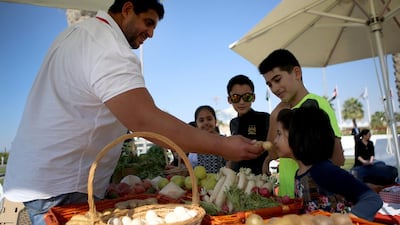 Former royal security guard Mohammed Salama, 37, has teamed up with Yas Viceroy Hotel to bring his organic fruit and vegetable market, as well as a selection of his ducks, chickens and rabbits, to the hotel’s new Saturday family picnic brunches on their lawn. Ravindranath K / The National