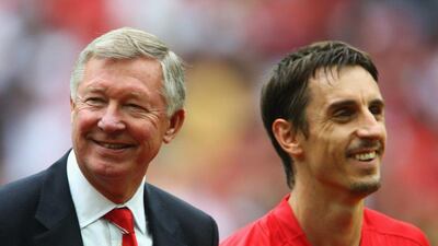 Then-Manchester United manager Alex Ferguson shown with then-player Gary Neville during an August 2008 match. Phil Cole / Getty Images