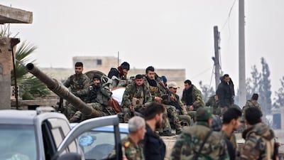 Syrian army soldiers advance in Tall Touqan village, in Syria's northwestern Idlib province, about 45 kilometres southwest of Aleppo AFP