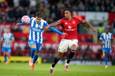 Manchester United's Leny Yoro vies for the ball with Brighton's Yasin Ayari. AP