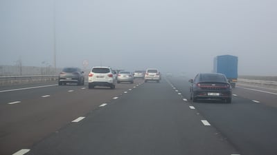 Traffic slowed on the E11 highway at Al Raha due to fog.
