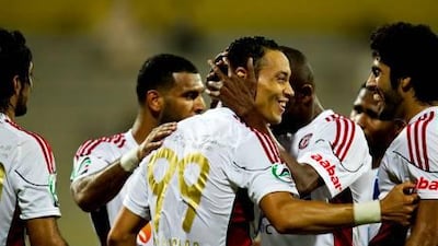It took 32 minutes for Ricardo Oliveira, centre, to score the first of three goals against Ajman at Al Wasl Stadium last night.
