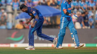 Sri Lanka's Dilshan Madushanka, left, celebrates the dismissal of India's Virat Kohli. AP