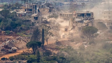 Israeli tanks and military vehicles on patrol among the ruins of southern Lebanon. AFP