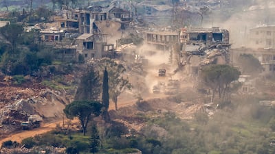 Israeli tanks and military vehicles on patrol among the ruins of southern Lebanon. AFP