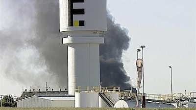 Smoke billows from the site of the plane crash in Australia. Channel 9 via AP