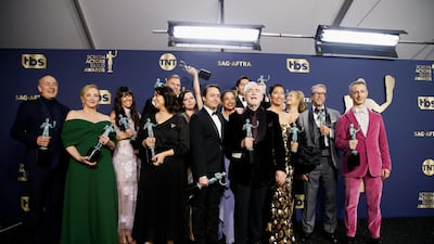 The cast of 'Succession' backstage with their Outstanding Performance by an Ensemble in a Drama Series trophies at the 28th Screen Actors Guild Awards, in Santa Monica, California. Reuters