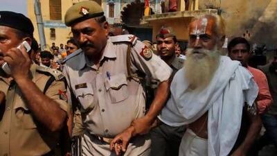 Police detain an elderly Hindu holy man in Ayodhya for allegedly defying a ban on pilgrimages to a disputed holy site that has been the cause of deadly clashes between Hindus and Muslims.