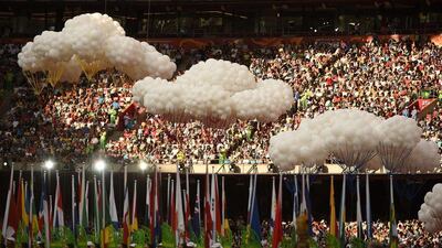 Spectators watch the opening ceremonies of the 2015 Athletics World Championships on Saturday inside the Bird's Nest in Beijing. Olivier Morin / AFP