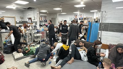 Patients being treated after Israeli troops withdrew. AFP